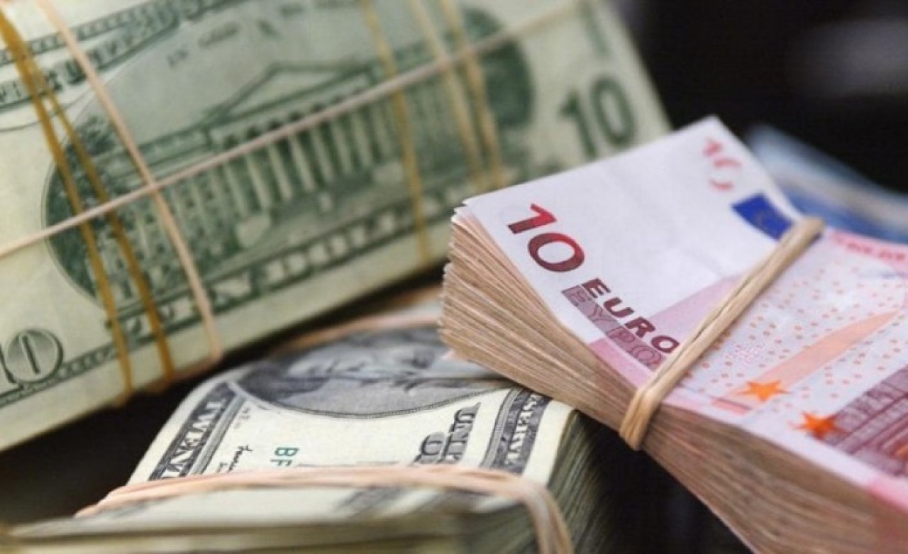 Fed'in faiz indirimi doları düşürdü