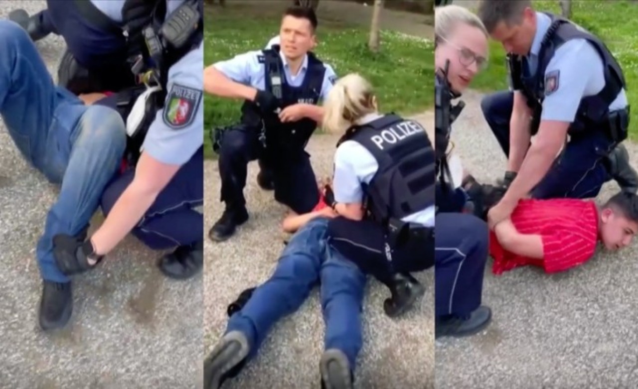 Yer Almanya: Yerde yatan 13 yaşındaki Emirhan Altıntaş,  başındakiler de Alman polisi! Büyük tepki