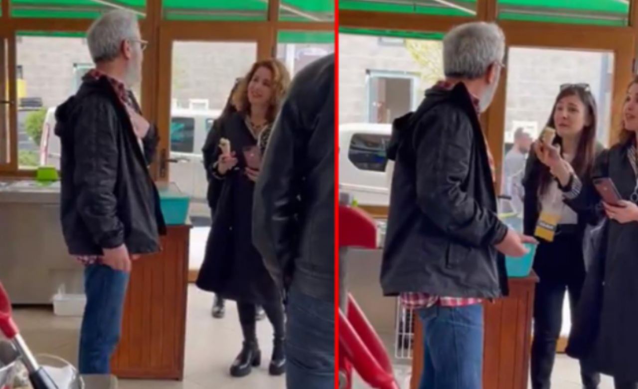 Duvardaki posterin fotoğrafını çekmek isteyen Nagehan Alçı'yı esnaf engelledi: 'Özür dile'