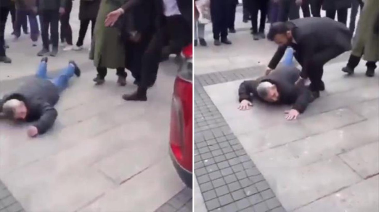Erzurum'da kendini Togg'un önüne atan adam 'Çiğne beni çiğne' diye bağırıp yeri yumrukladı