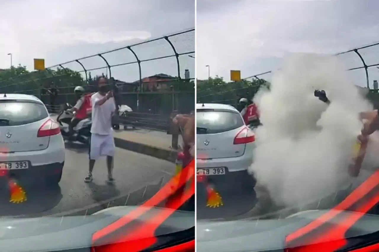 Trafikte ilginç anlar! Bıçağı görünce yangın tüpünü sıkmaya başladı