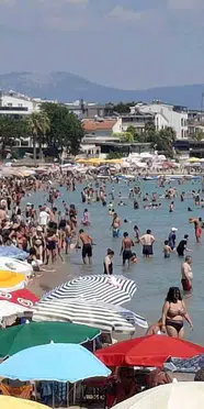 Didim’de sıcaklık 30 dereceyi aştı: Altınkum Plajı dolup taştı