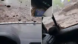 Şili'de nehir taştı: Sel sularına kapılan sürücü, sürüklendiği anları kaydetti
