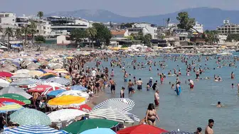 Didim’de sıcaklık 30 dereceyi aştı: Altınkum Plajı dolup taştı