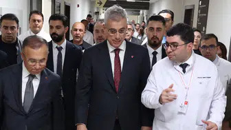 Bakan Memişoğlu Melih Meriç'i hastanede ziyaret etti
