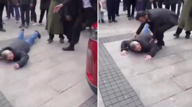 Erzurum'da kendini Togg'un önüne atan adam 'Çiğne beni çiğne' diye bağırıp yeri yumrukladı