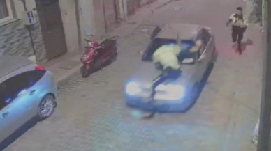 Polis memurunu aracının kaputunda sürükleyen sürücü tutuklandı