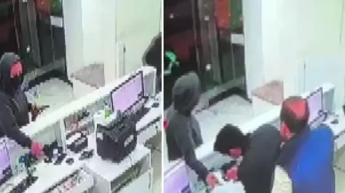 Döviz bürosuna giren hırsız iş yeri çalışanını rehin alıp kaçtı