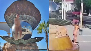 Heykelin önünde soyunan kadın tutuklandı