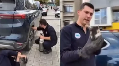 Otomobile sıkışan kediyi hava tüpü kullanarak çıkardılar