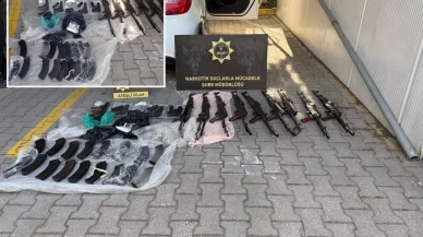 Polis memurunun kullandığı araçtan cephaneliği çıktı!