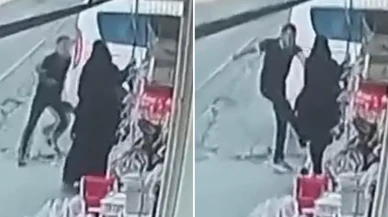 Sokak ortasında eşine tekme ve yumrukla saldırdı