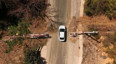 Orman yangınlarına karşı mahalle çıkışlarına sürgülü kapı taktırdı