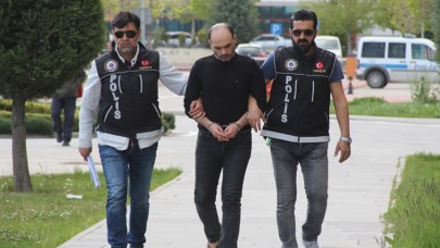 Uyuşturucuyu 11 yaşındaki oğlunun üzerine sarmış