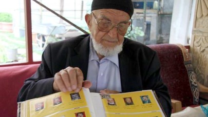 İlçede ölenlerin fotoğraflarını arşivliyor