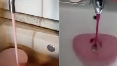 Musluktan akan pembe sıvının ne olduğunu öğrenince depolamaya başladılar!