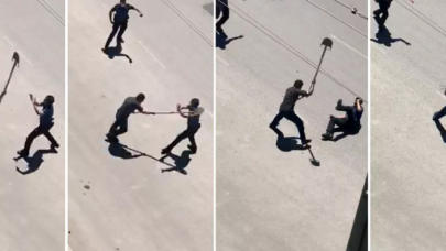 Skandal görüntü: Ambulansa taş atıp polisin başına kürekle vurdu!