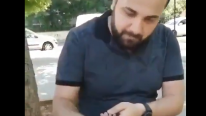 Tepki çeken görüntüler: Parayı et yerken peçete olarak kullandı!