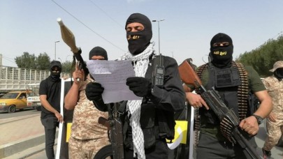 Irak'ta İran'a yakın Şii milislerden,  ABD ve müttefiklerine tehdit