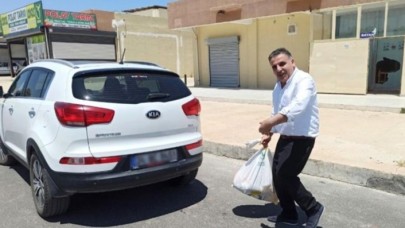 Kooperatif Başkanı Kureyşi Çelik'ten tepki çeken hareket: Lüks aracı ile gelip gıda yardımı aldı