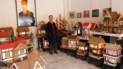 Çocukluk özlemini atık malzemelerden yaptığı ahşap evlerle gideriyor