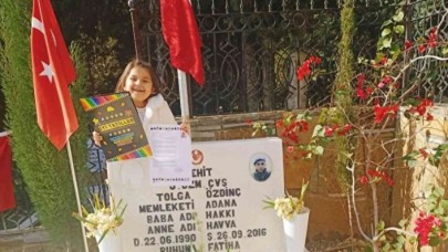 En hüzünlü hediye: İlk karnesini hiç görmediği şehit babasına götürdü