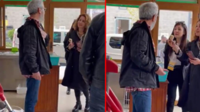 Duvardaki posterin fotoğrafını çekmek isteyen Nagehan Alçı'yı esnaf engelledi: 'Özür dile'