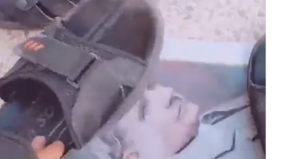 Suriyeli mülteci Atatürk'ün fotoğrafına terliğiyle basarak dalga geçti!