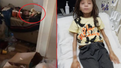 İcra ekibinin boşaltmak için girdiği çöp evden 1 yıldır odada kilitli tutulan çocuk çıktı
