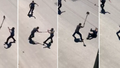 Skandal görüntü: Ambulansa taş atıp polisin başına kürekle vurdu!