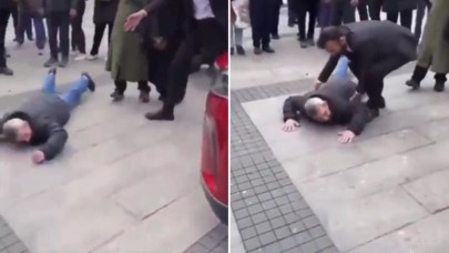 Erzurum'da kendini Togg'un önüne atan adam 'Çiğne beni çiğne' diye bağırıp yeri yumrukladı