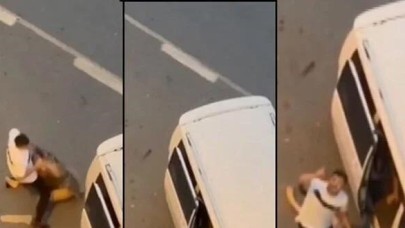 Esenyurt'ta sokak ortasında döverek bayılttığı kadını minibüsle kaçırdı. Tepki gösterenleri de tehdit etti