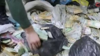 Ölen kadın dilencinin evinden poşetler içinde 400 bin dolar çıktı