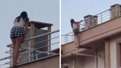 Kendini boşluğa bırakmak üzere olan genç kadın,  duyduğu ses üzerine intihardan vazgeçti