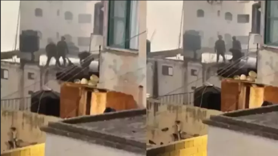 İnfiale neden olan görüntü: Öldürülen Filistinlinin cenazesini çatıdan attılar!