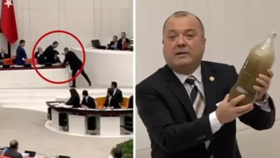 Bakan Kurum,  CHP'li vekilin getirdiği pis suyu yere fırlattı