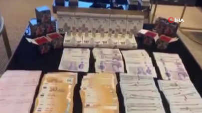 Yolsuzluk soruşturmasında şüphelilerin evinde balya balya para bulundu