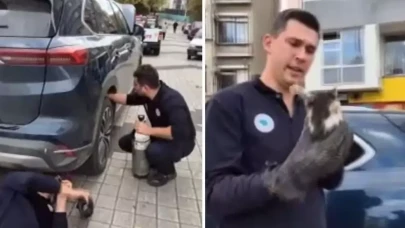 Otomobile sıkışan kediyi hava tüpü kullanarak çıkardılar