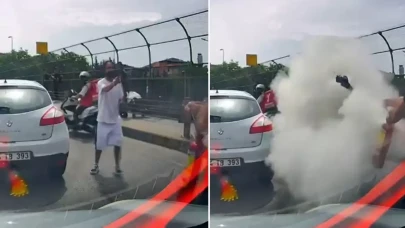 Trafikte ilginç anlar! Bıçağı görünce yangın tüpünü sıkmaya başladı