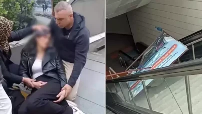 Metro istasyonunda yürüyen merdivenlerde reklam panosu genç kadının üzerine düştü