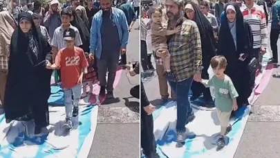 Tahran'da halk, ABD ve İsrail bayraklarını ayaklarıyla çiğnedi
