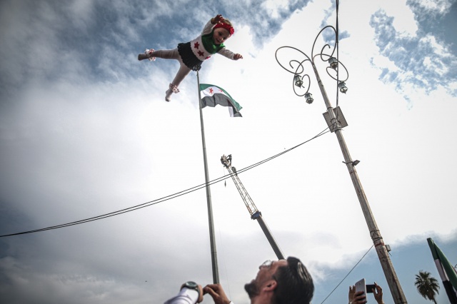 İç savaşın 11. yılına girdiği Suriye'de gösteriler düzenlendi 2